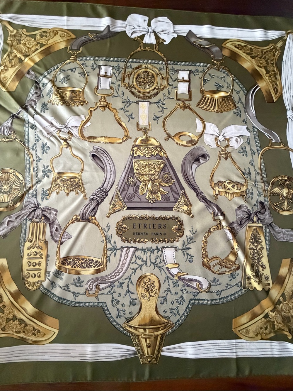 Hermes Etriers Silk Scarf with Gold Equestrian Hardware Print in Olive and Cream